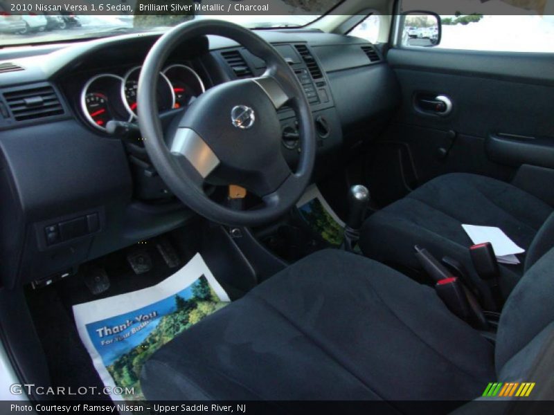 Brilliant Silver Metallic / Charcoal 2010 Nissan Versa 1.6 Sedan