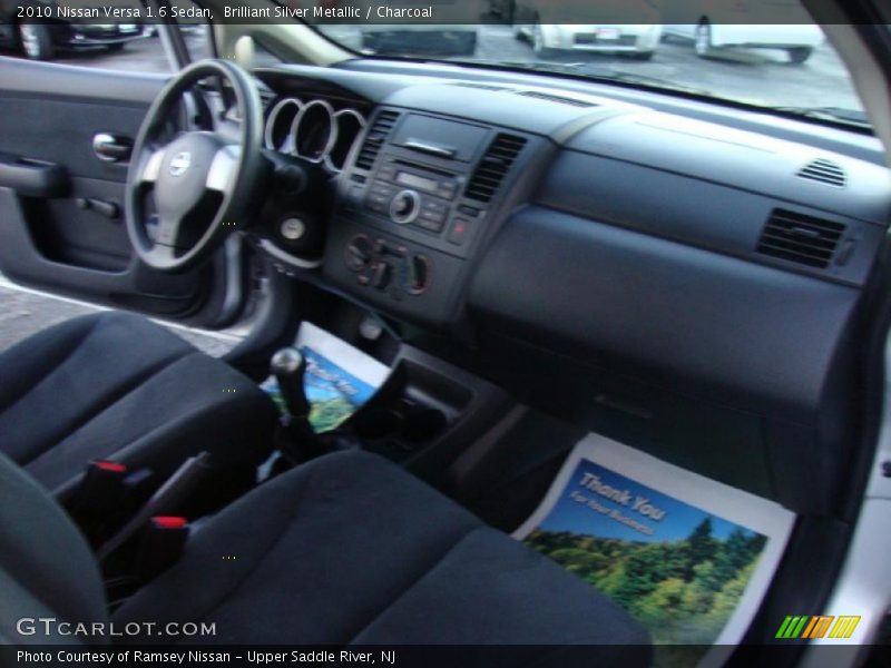 Brilliant Silver Metallic / Charcoal 2010 Nissan Versa 1.6 Sedan