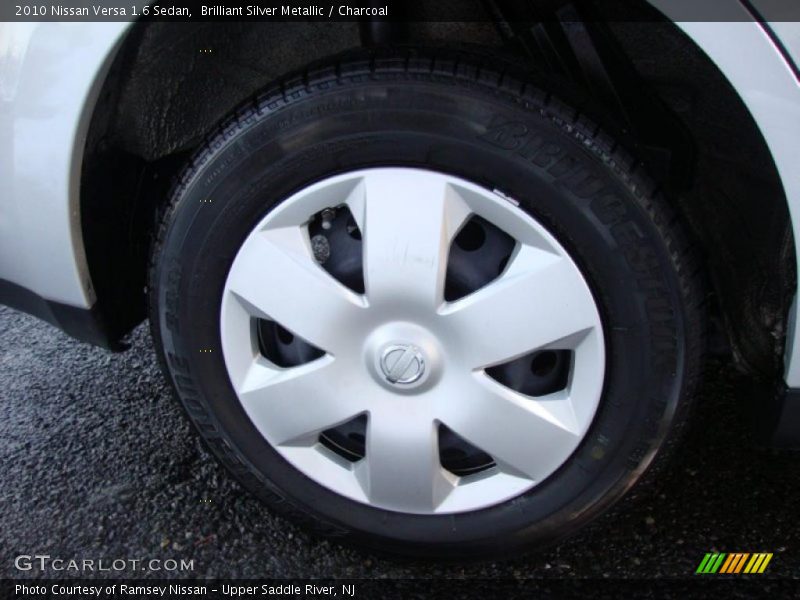 Brilliant Silver Metallic / Charcoal 2010 Nissan Versa 1.6 Sedan