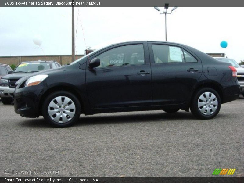 Black Sand Pearl / Bisque 2009 Toyota Yaris S Sedan