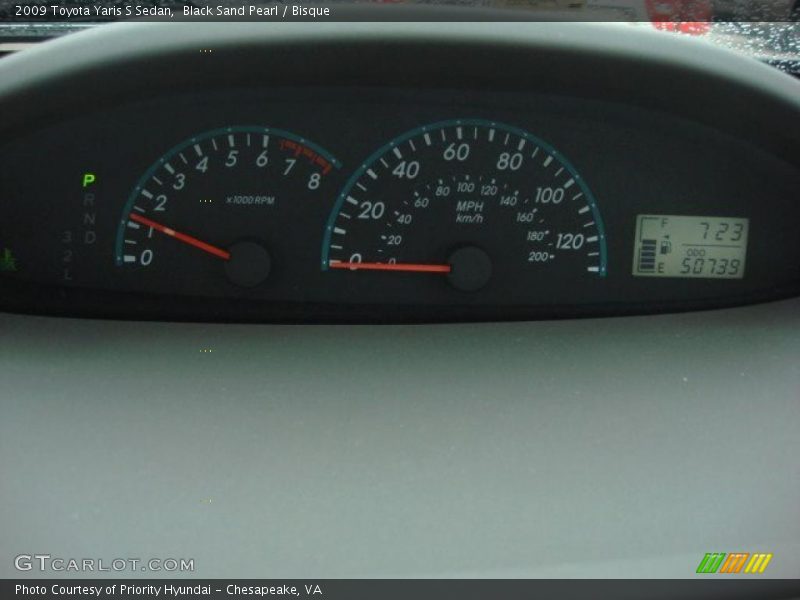 Black Sand Pearl / Bisque 2009 Toyota Yaris S Sedan