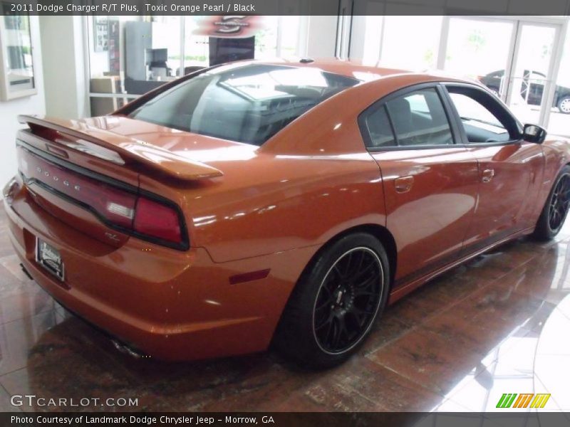 Toxic Orange Pearl / Black 2011 Dodge Charger R/T Plus