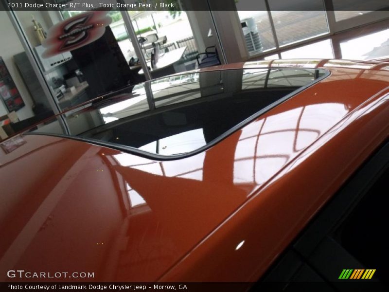 Toxic Orange Pearl / Black 2011 Dodge Charger R/T Plus