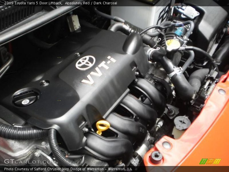 Absolutely Red / Dark Charcoal 2009 Toyota Yaris 5 Door Liftback