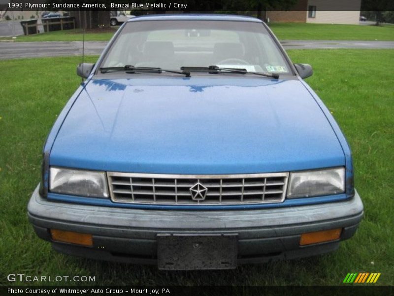 Banzai Blue Metallic / Gray 1992 Plymouth Sundance America