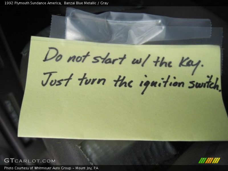Banzai Blue Metallic / Gray 1992 Plymouth Sundance America