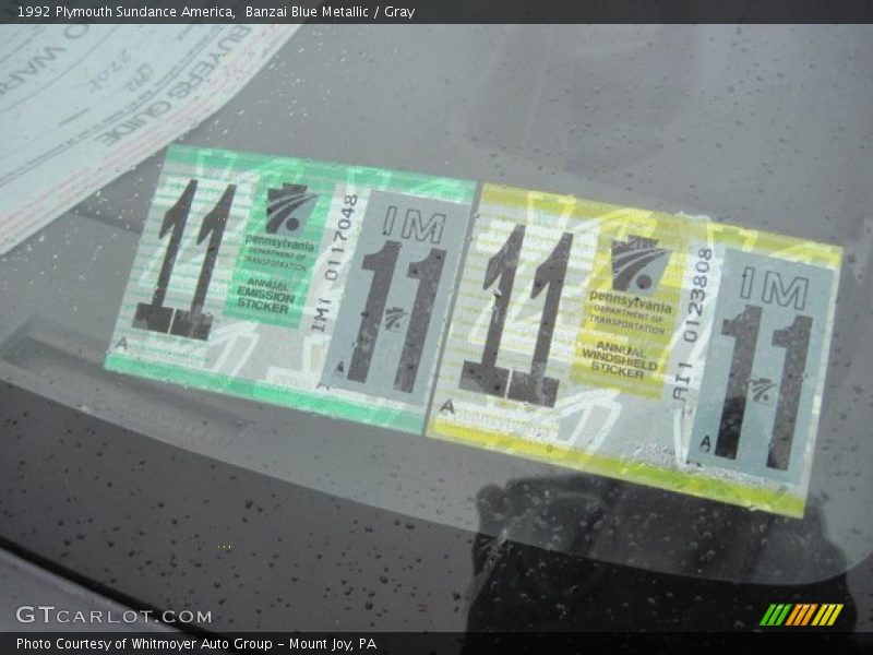 Banzai Blue Metallic / Gray 1992 Plymouth Sundance America