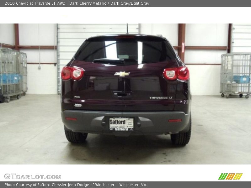 Dark Cherry Metallic / Dark Gray/Light Gray 2010 Chevrolet Traverse LT AWD