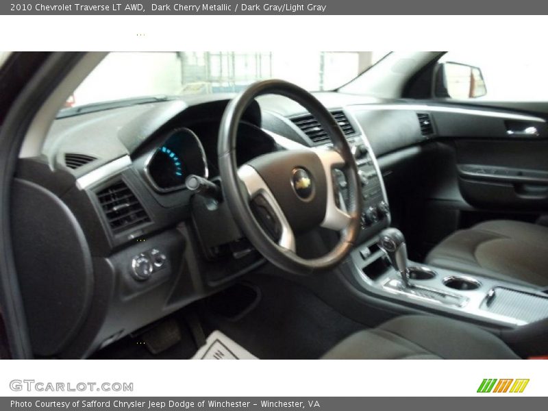 Dark Cherry Metallic / Dark Gray/Light Gray 2010 Chevrolet Traverse LT AWD