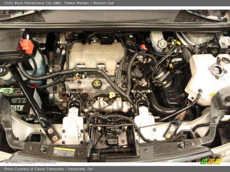 Pewter Metallic / Medium Oak 2002 Buick Rendezvous CXL AWD