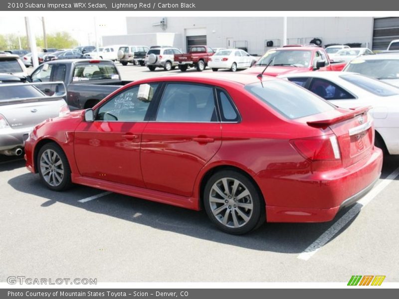 Lightning Red / Carbon Black 2010 Subaru Impreza WRX Sedan