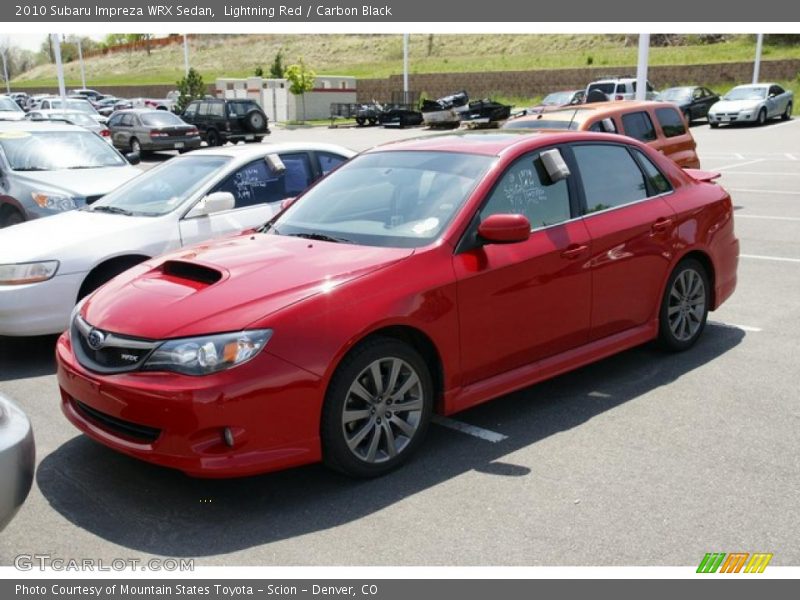 Lightning Red / Carbon Black 2010 Subaru Impreza WRX Sedan