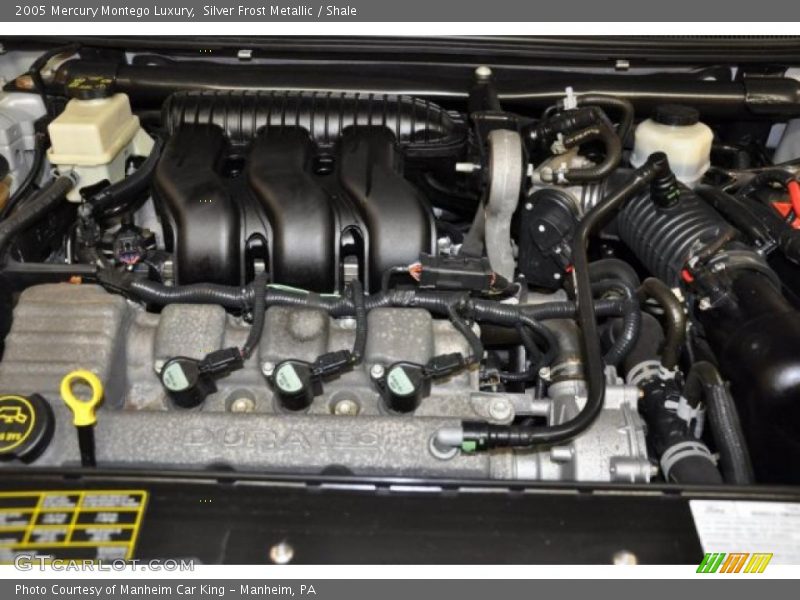 Silver Frost Metallic / Shale 2005 Mercury Montego Luxury