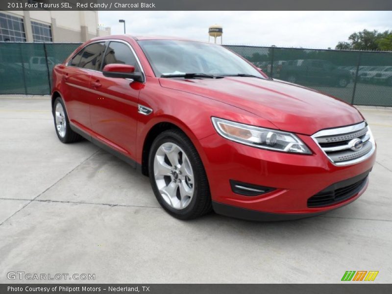 Red Candy / Charcoal Black 2011 Ford Taurus SEL
