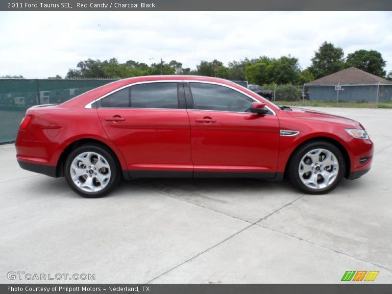 Red Candy / Charcoal Black 2011 Ford Taurus SEL