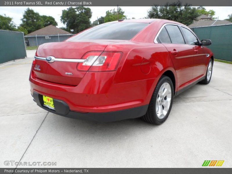 Red Candy / Charcoal Black 2011 Ford Taurus SEL