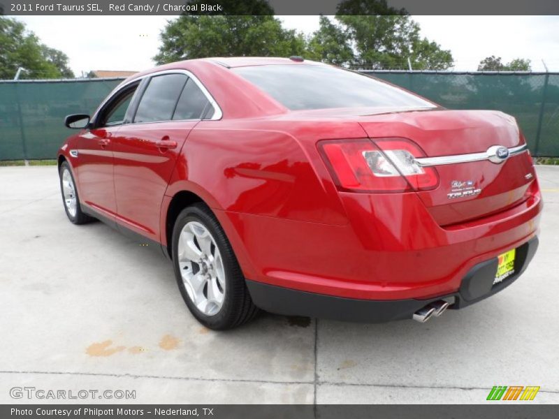 Red Candy / Charcoal Black 2011 Ford Taurus SEL
