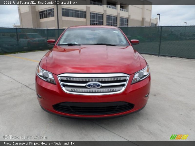 Red Candy / Charcoal Black 2011 Ford Taurus SEL