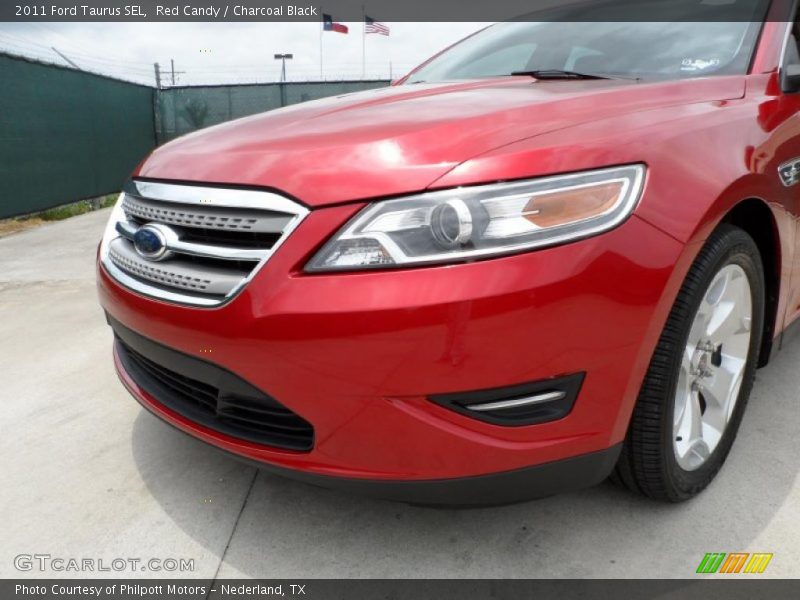Red Candy / Charcoal Black 2011 Ford Taurus SEL