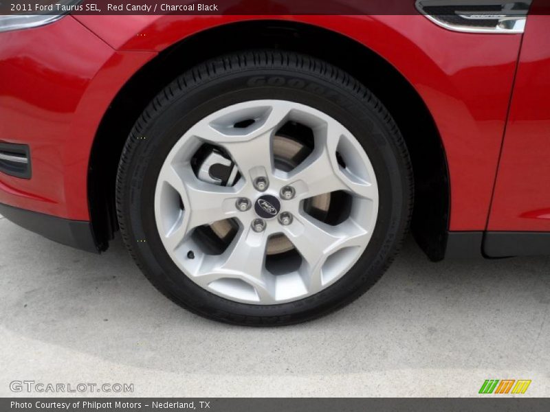 Red Candy / Charcoal Black 2011 Ford Taurus SEL