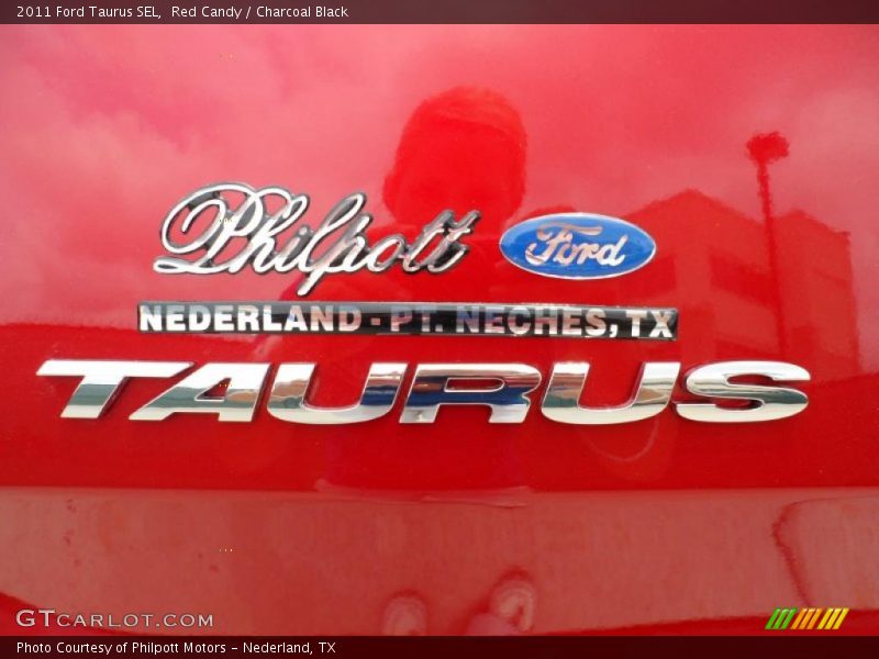 Red Candy / Charcoal Black 2011 Ford Taurus SEL