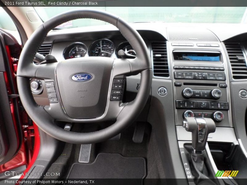 Red Candy / Charcoal Black 2011 Ford Taurus SEL