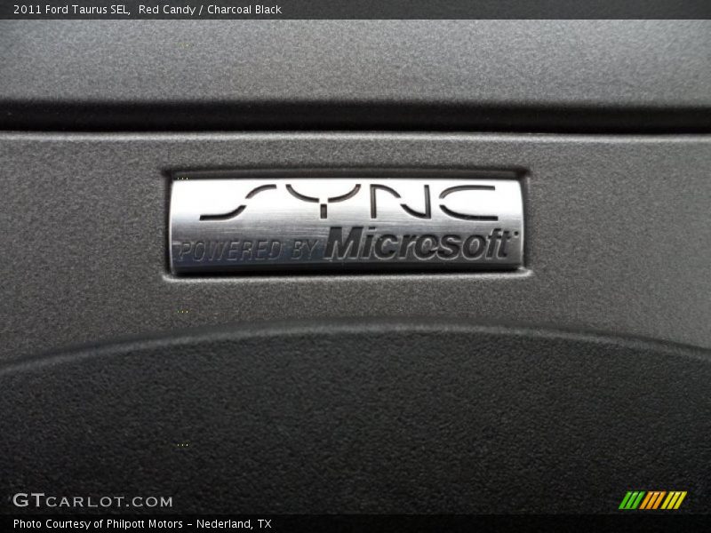 Red Candy / Charcoal Black 2011 Ford Taurus SEL