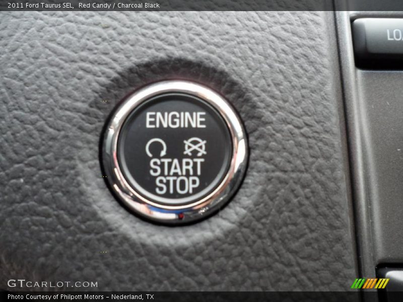 Red Candy / Charcoal Black 2011 Ford Taurus SEL