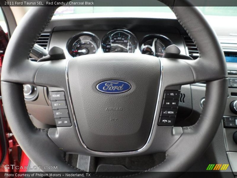 Red Candy / Charcoal Black 2011 Ford Taurus SEL