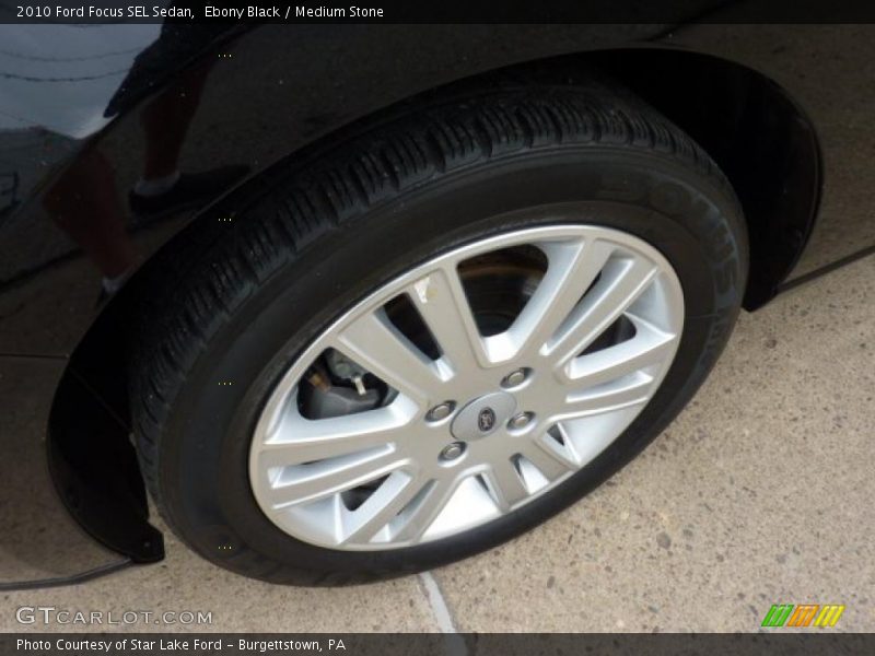 Ebony Black / Medium Stone 2010 Ford Focus SEL Sedan