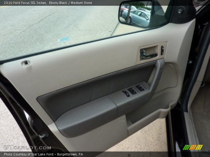 Ebony Black / Medium Stone 2010 Ford Focus SEL Sedan