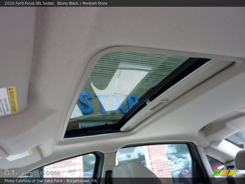 Ebony Black / Medium Stone 2010 Ford Focus SEL Sedan