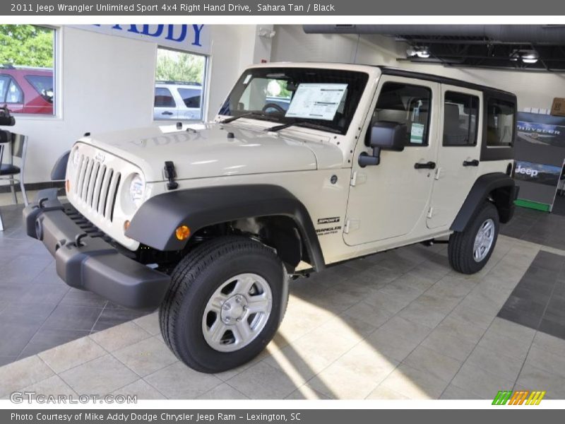 Front 3/4 View of 2011 Wrangler Unlimited Sport 4x4 Right Hand Drive