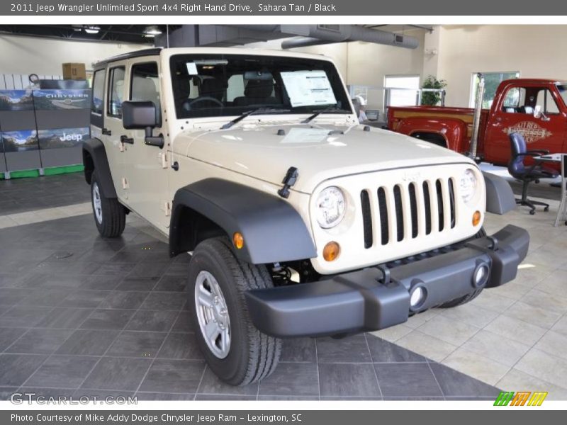 Sahara Tan / Black 2011 Jeep Wrangler Unlimited Sport 4x4 Right Hand Drive