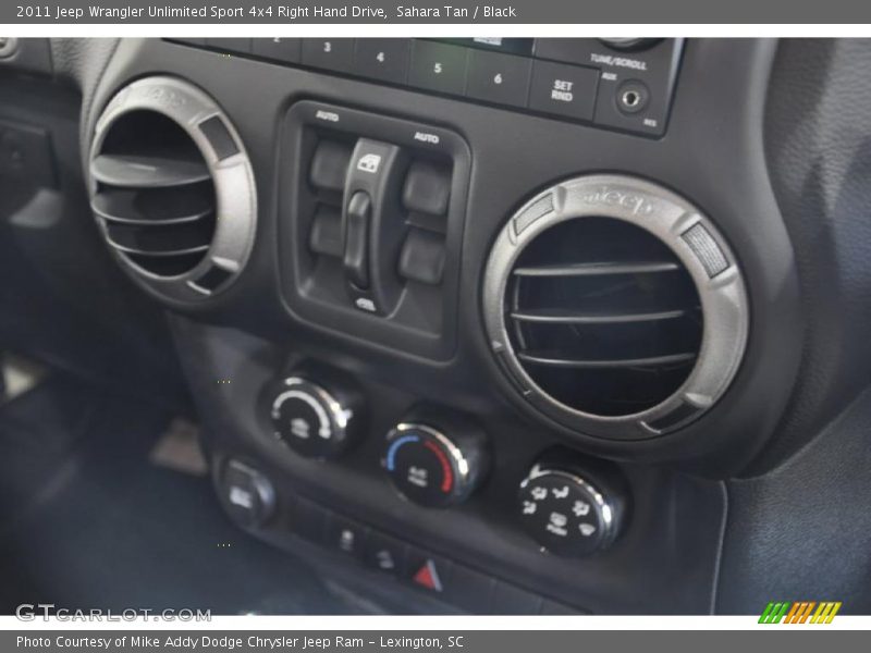 Sahara Tan / Black 2011 Jeep Wrangler Unlimited Sport 4x4 Right Hand Drive