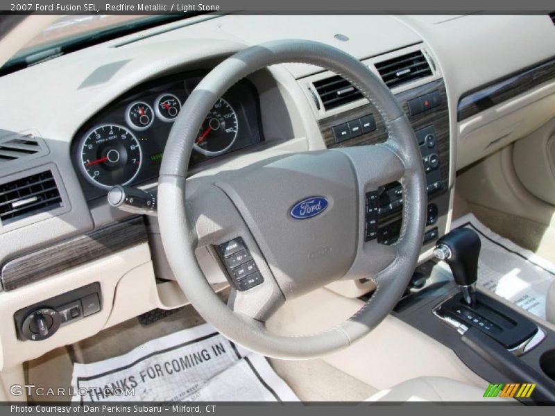 Redfire Metallic / Light Stone 2007 Ford Fusion SEL
