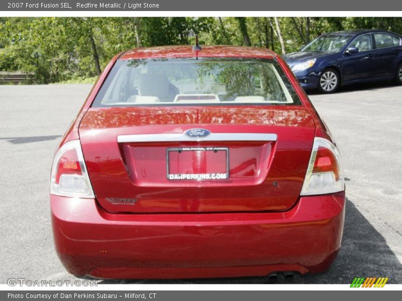 Redfire Metallic / Light Stone 2007 Ford Fusion SEL