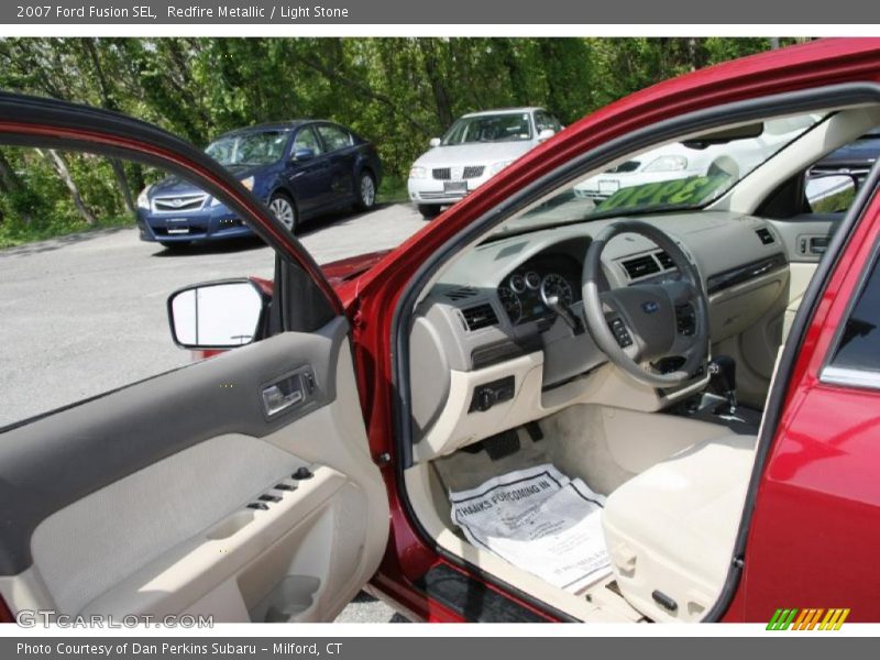 Redfire Metallic / Light Stone 2007 Ford Fusion SEL