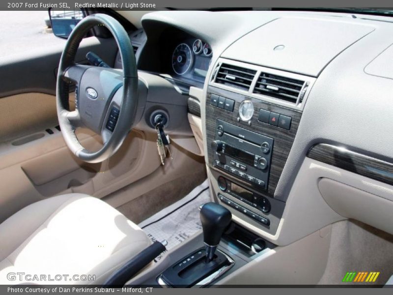 Redfire Metallic / Light Stone 2007 Ford Fusion SEL