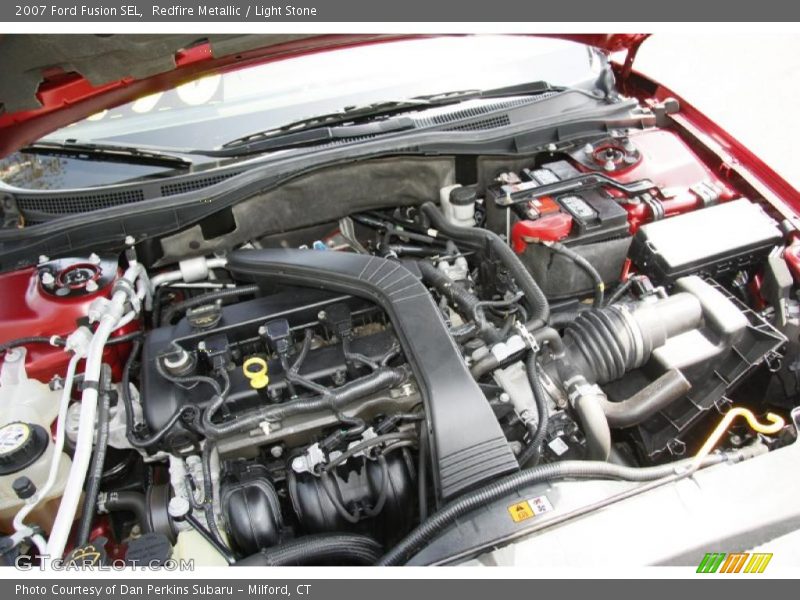 Redfire Metallic / Light Stone 2007 Ford Fusion SEL