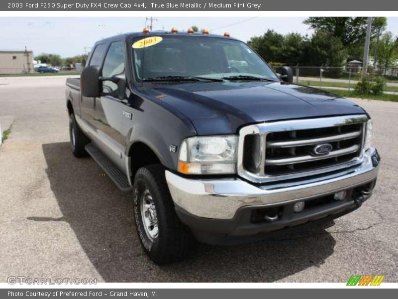 True Blue Metallic / Medium Flint Grey 2003 Ford F250 Super Duty FX4 Crew Cab 4x4