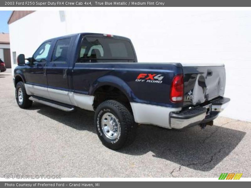 True Blue Metallic / Medium Flint Grey 2003 Ford F250 Super Duty FX4 Crew Cab 4x4