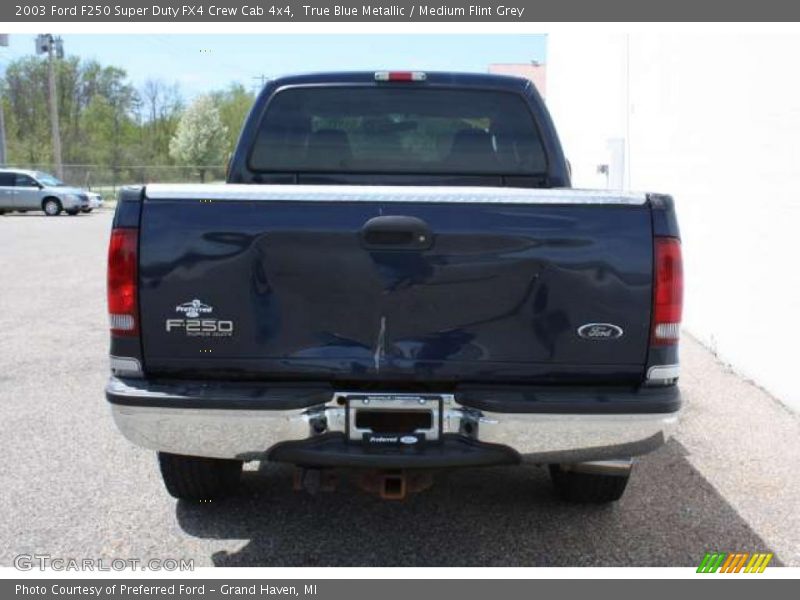 True Blue Metallic / Medium Flint Grey 2003 Ford F250 Super Duty FX4 Crew Cab 4x4