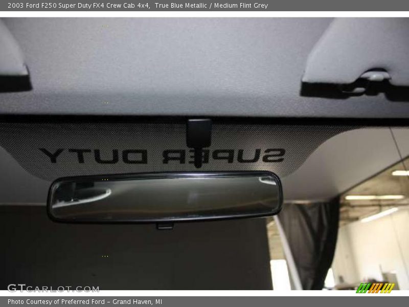 True Blue Metallic / Medium Flint Grey 2003 Ford F250 Super Duty FX4 Crew Cab 4x4
