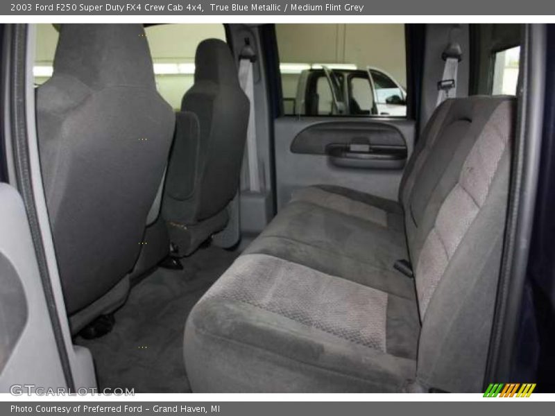 True Blue Metallic / Medium Flint Grey 2003 Ford F250 Super Duty FX4 Crew Cab 4x4