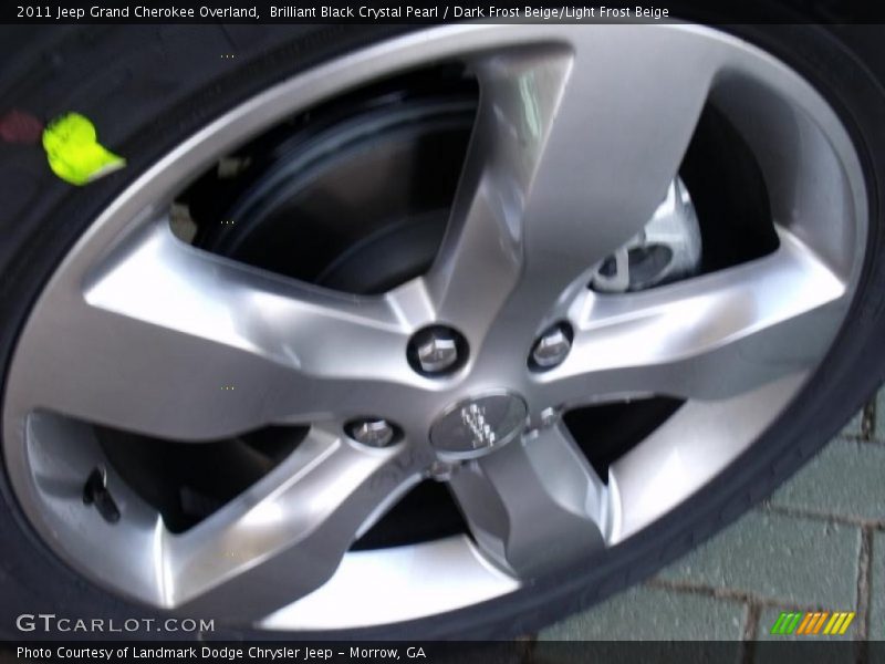 Brilliant Black Crystal Pearl / Dark Frost Beige/Light Frost Beige 2011 Jeep Grand Cherokee Overland