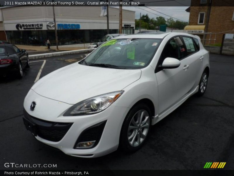 Front 3/4 View of 2011 MAZDA3 s Grand Touring 5 Door