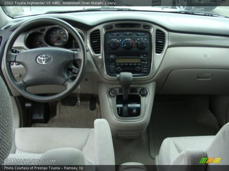 Millennium Silver Metallic / Ivory 2002 Toyota Highlander V6 4WD