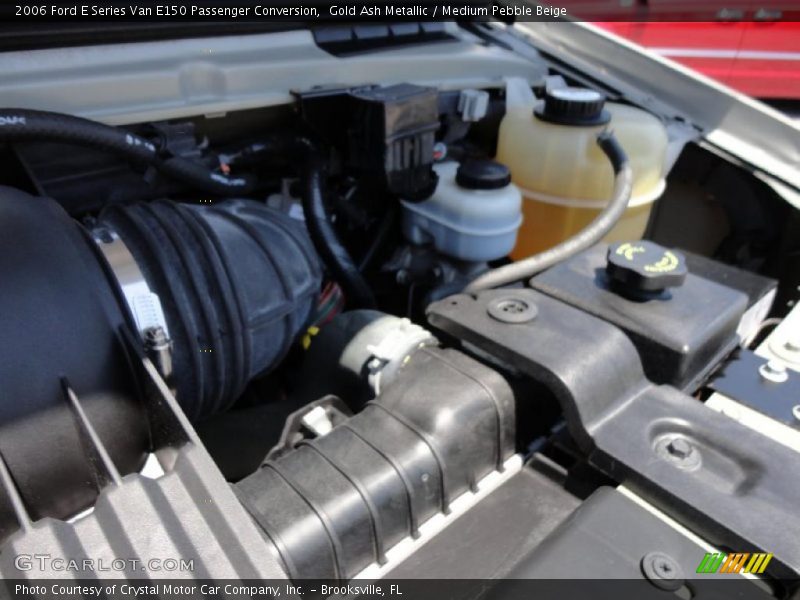 Gold Ash Metallic / Medium Pebble Beige 2006 Ford E Series Van E150 Passenger Conversion