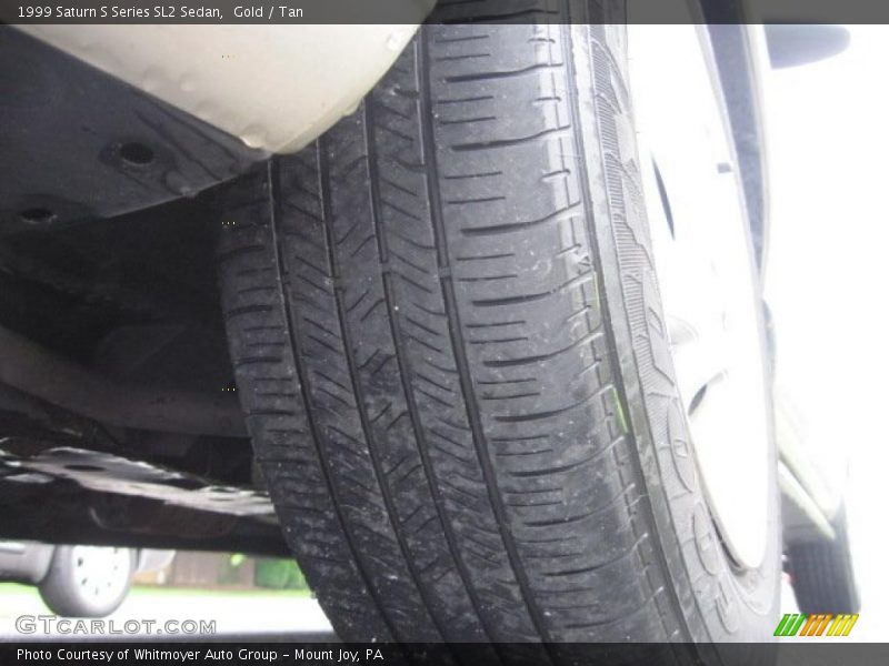 Gold / Tan 1999 Saturn S Series SL2 Sedan